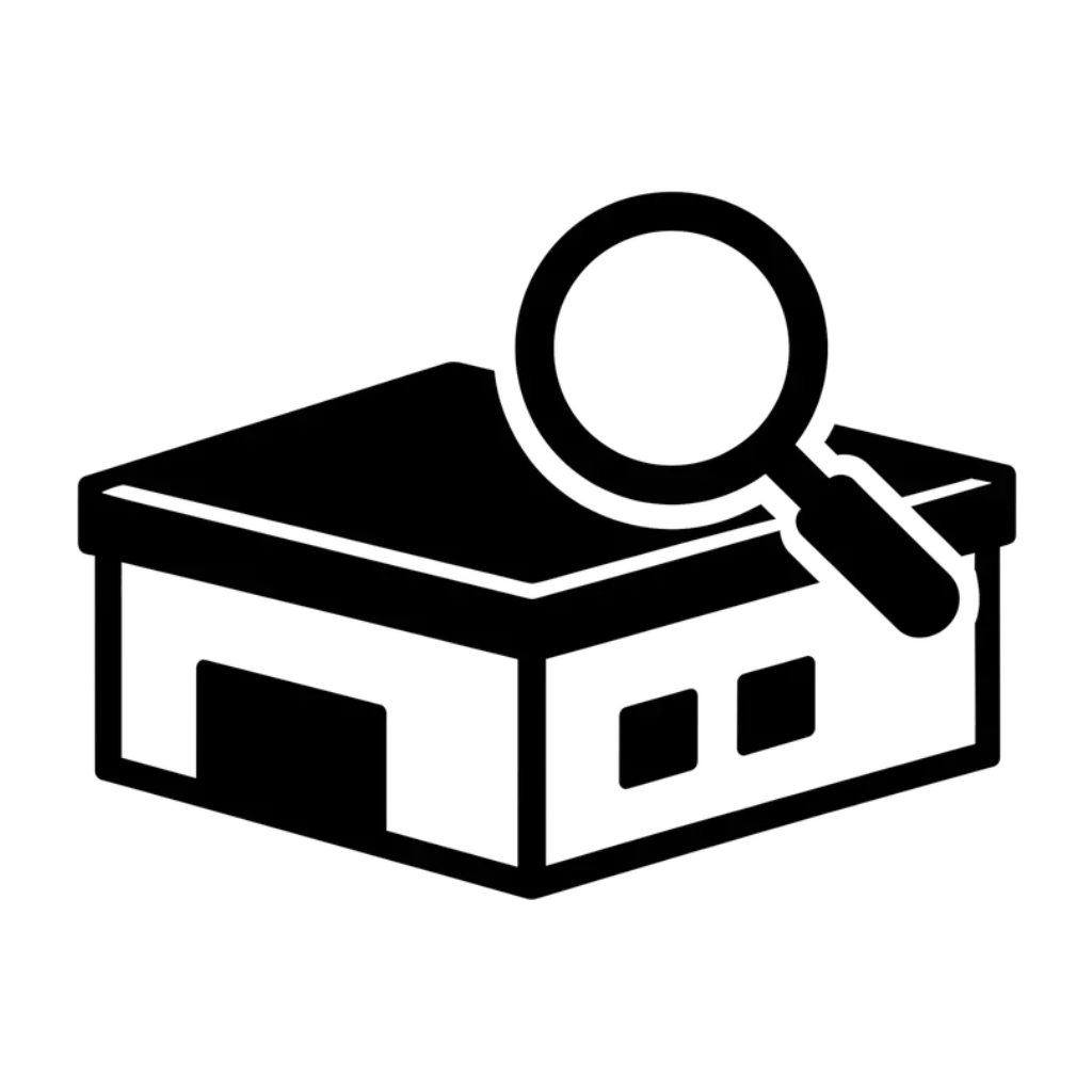 Black and white icon of a building with a large magnifying glass over its roof, symbolizing inspection or property search.